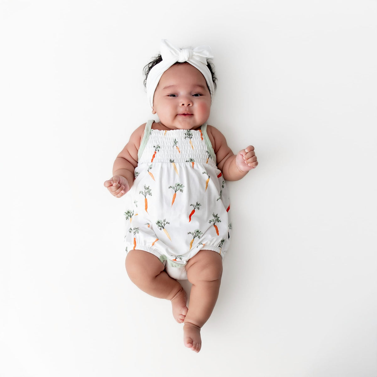 Smocked Bubble Romper in Carrot