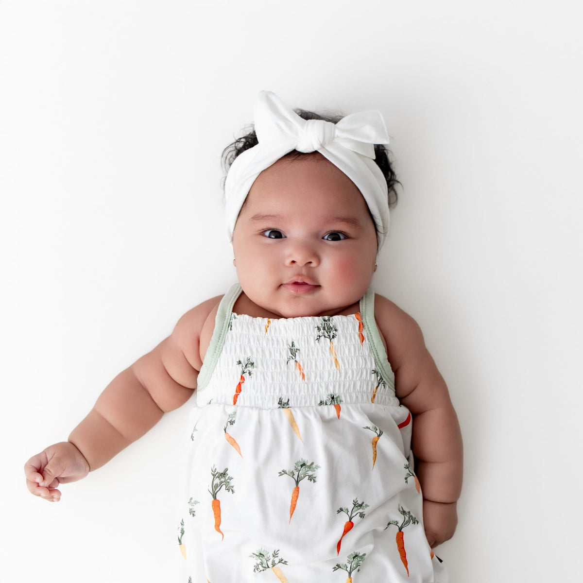 Smocked Bubble Romper in Carrot